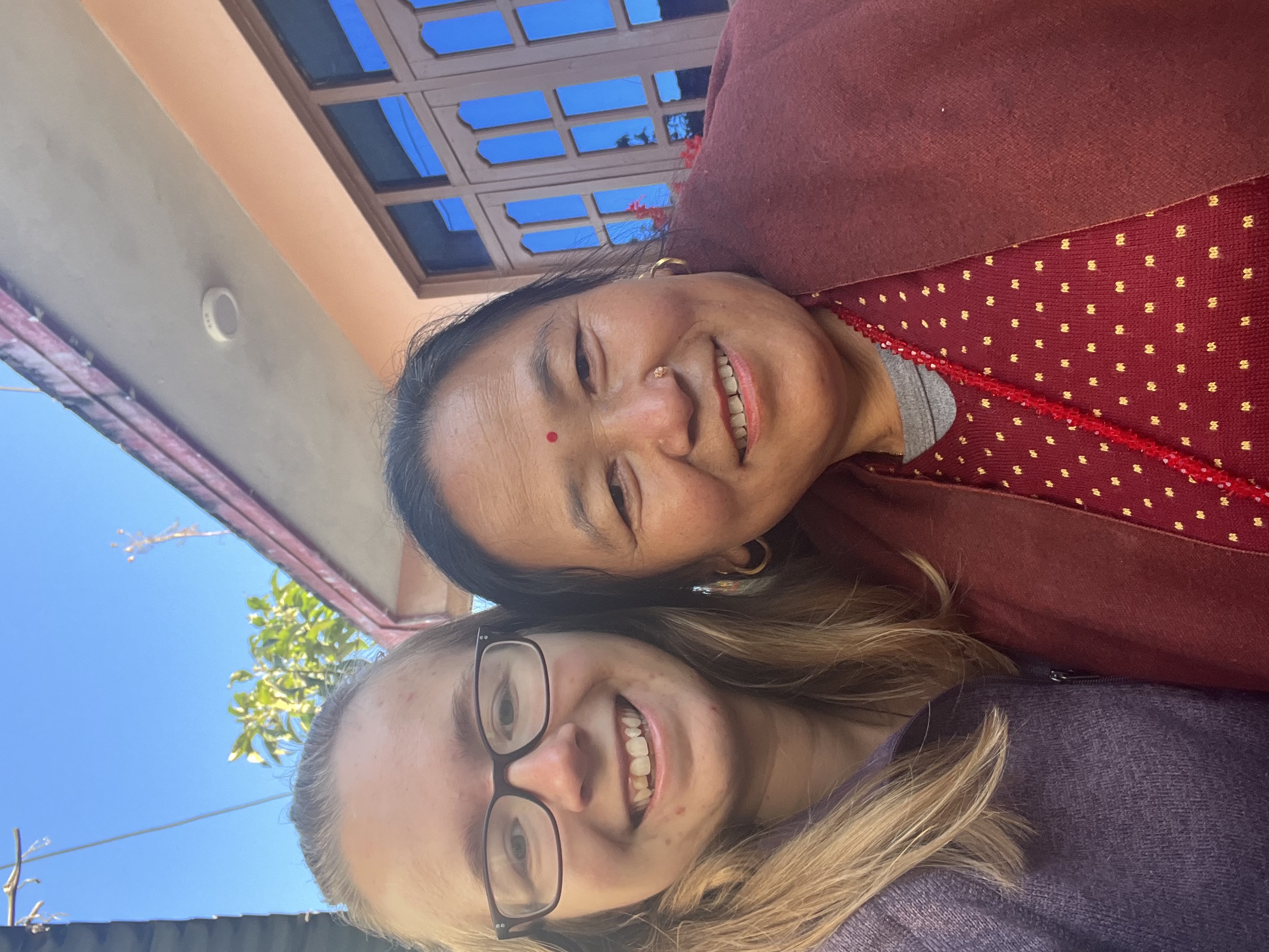 A selfie of a Canadian woman and a Nepali woman.