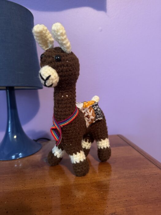 A cute brown llama doll, a gift from Peru