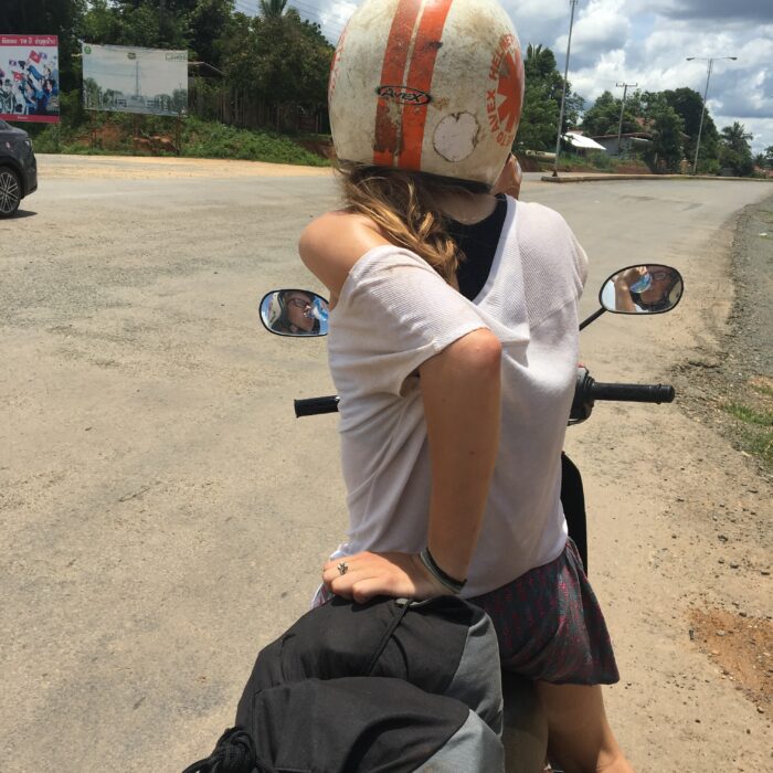 A girl on a motorcycle. 